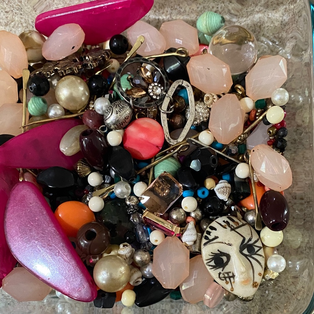 Lot of unique beads, many colors, different types of materials.
